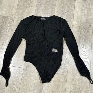 MANIERE DE VOIR Bodysuit Cut Out Black Size 10
Black Long Sleeve